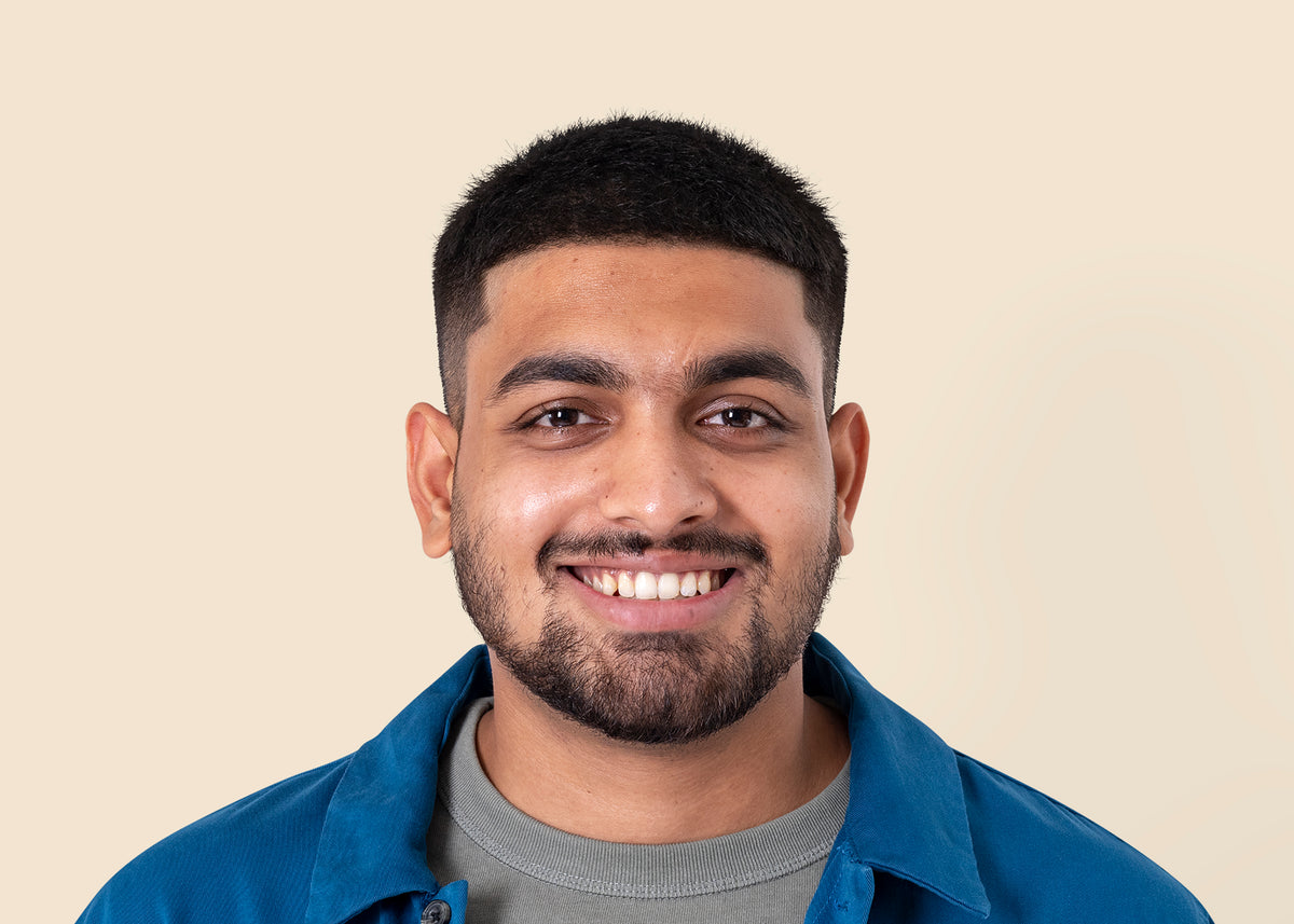 Indian man smiling mockup psd cheerful expression closeup portra